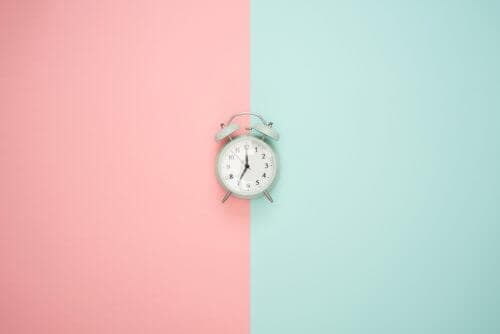 clock-pink-blue-background-time-heals-all-wounds