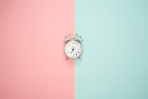 clock-pink-blue-background-time-heals-all-wounds