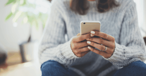 supportiv-moneygeek-covid-resources-mental-health-wellness-woman-on-phone