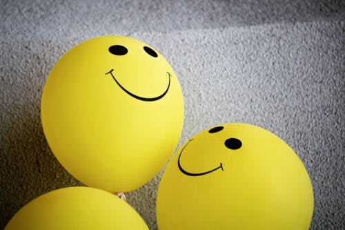 prevent-burnout-in-people-you-manage-when-you-are-a-manager-balloons-smiley
